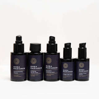 Shea Radiance travel size collagen face care regimen with cleanser, exfoliating toner, hydrating lotion, collagen serum, and vitamin C oil on a white background