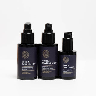 Shea Radiance travel size nighttime face care regimen with cleanser, hydrating lotion and vitamin C oil on a white background