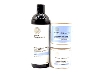 Shea Radiance unscented body care products including body wash, nourishing cream, and whipped butter on a white background
