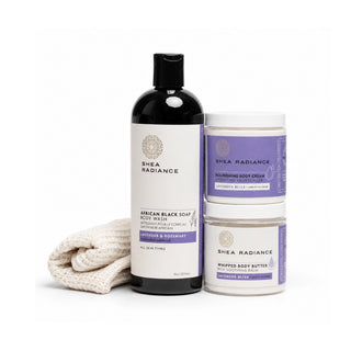 Shea Radiance lavender skincare products including a body wash, nourishing cream, whipped butter and sisal cloth on a white background