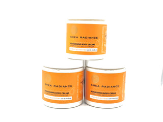 Three jars of Shea Radiance citrus nourishing body cream on a white background