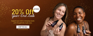 Promotional banner showing two smiling women holding Shea Radiance face care bottles against a warm brown background, with text reading “20% Off Year-End Sale,” “Sitewide,” and “Shop the Sale,” valid until January 5.