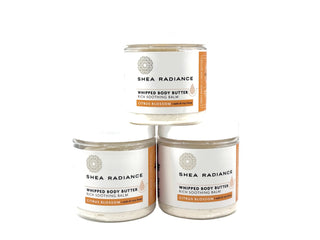 Shea Radiance citrus whipped body butter jars on a white background